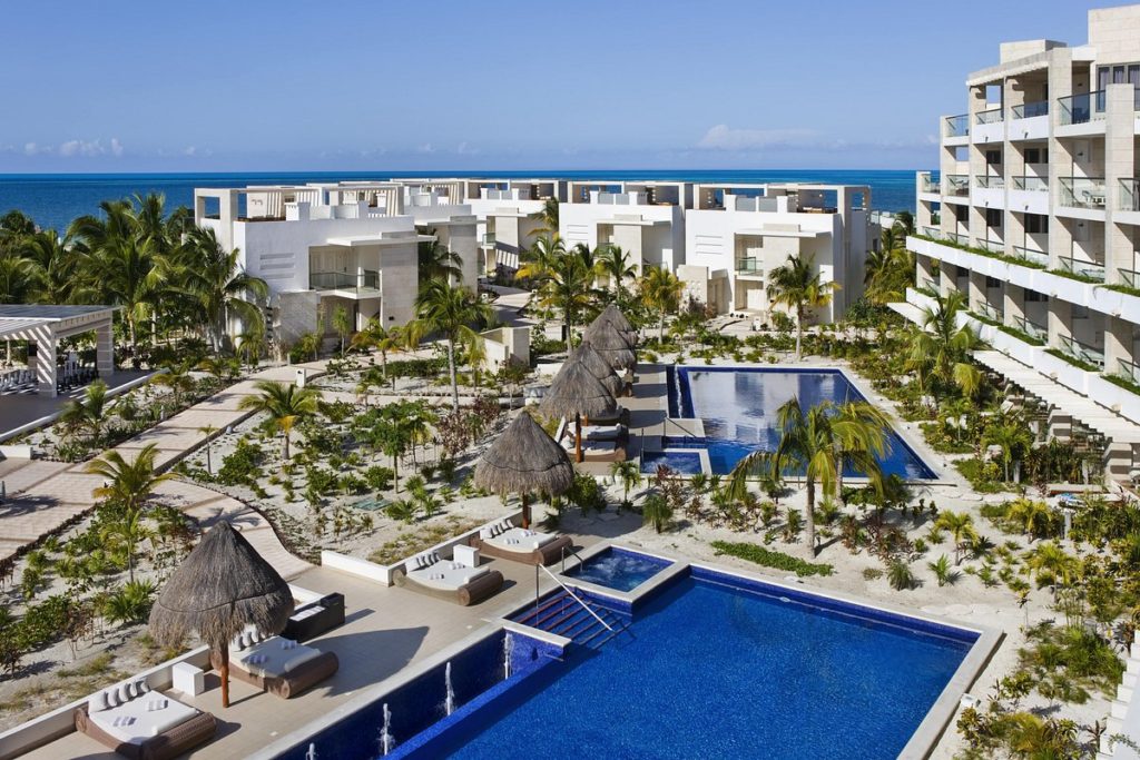 How far is The Beloved hotel from Cancun airport